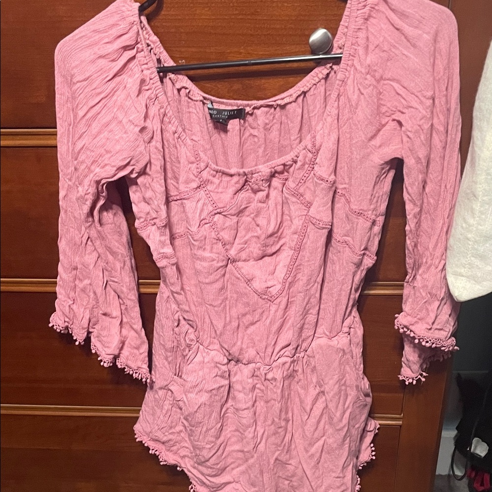 pink long-sleeved romper